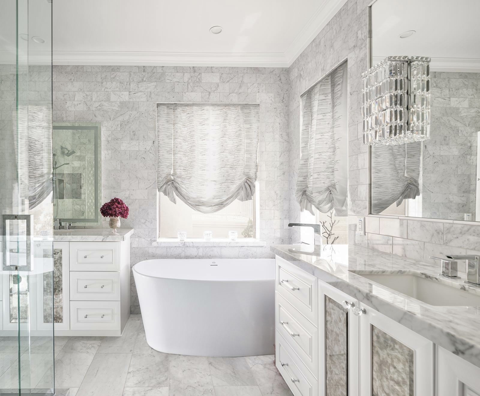 Luxury Custom Glass Bathroom Design | Clear Cut Glass and Tint Luxury bathroom featuring a freestanding soaking tub, marble finishes, and custom glass shower enclosure in an Arizona home, installed by Clear Cut Glass and Tint