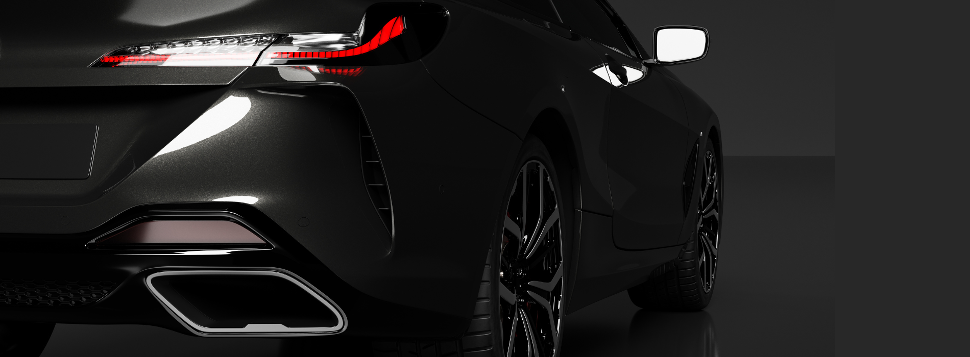 Black car with glossy paint protection film (PPF) installed, showing reflection and finish in Glendale, Arizona