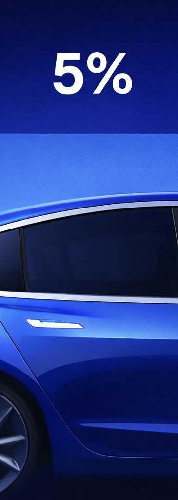 Tesla window with 5 percent window tint showing very dark, nearly opaque glass