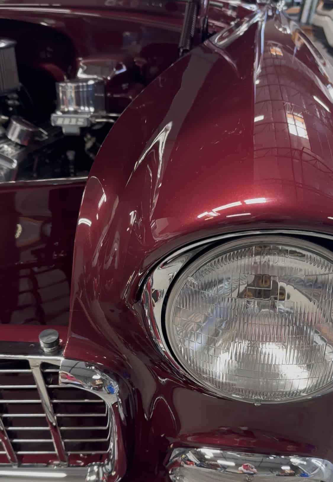 Classic Chevrolet vehicle with clear gloss paint protection film showing deep red paint finish in Glendale Arizona