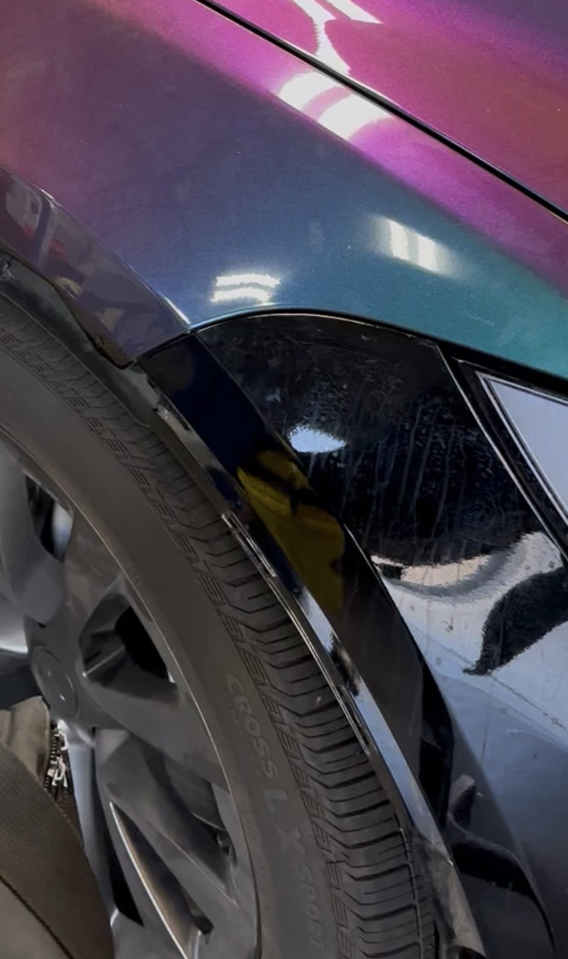 Tesla showing side-by-side comparison between factory paint and colored paint protection film in Glendale Arizona