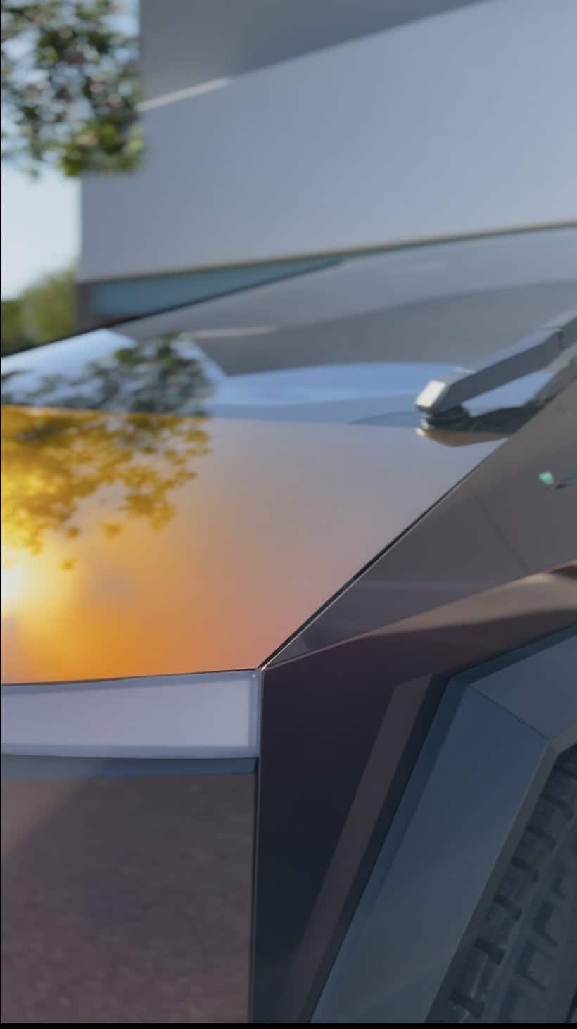 Tesla Cybertruck with colored paint protection film reflecting sunset tones in Glendale Arizona